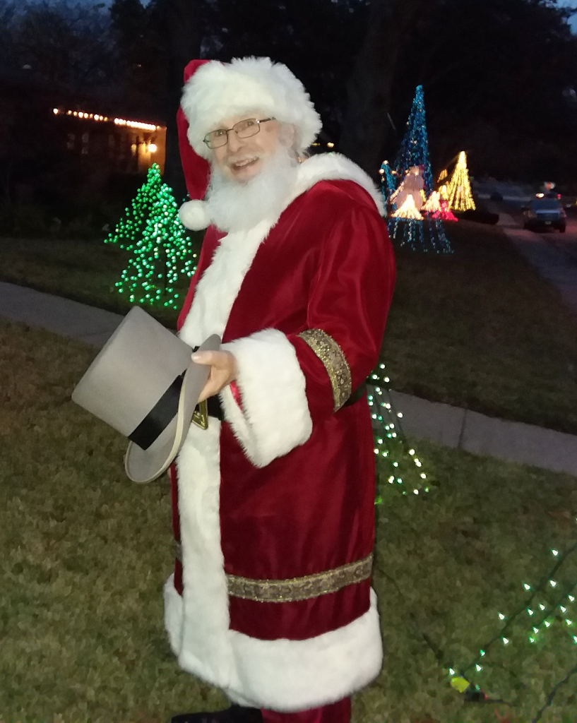 DI volunteer, David Lewis, poses as Santa Claus